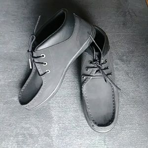 Never used. Stylish suede chukka boots.